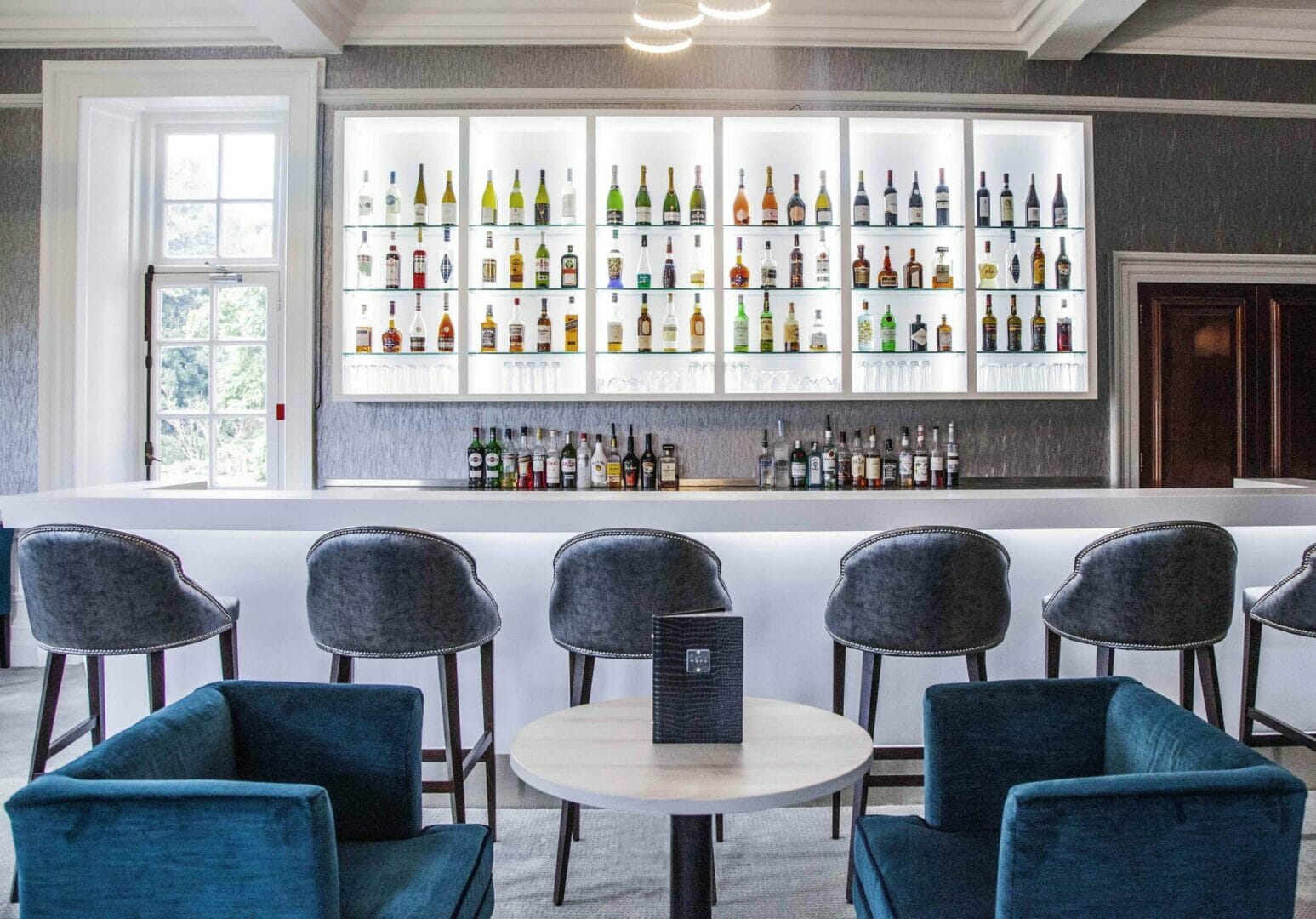 Glasses are clinking in a Surrey hotel’s sophisticated new bar